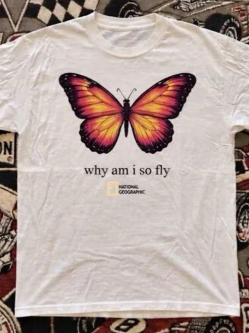National Geographic White Short Sleeve Tee with Orange-Purple Butterfly Graphic